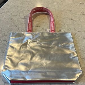 Silver Clinique bag NWT